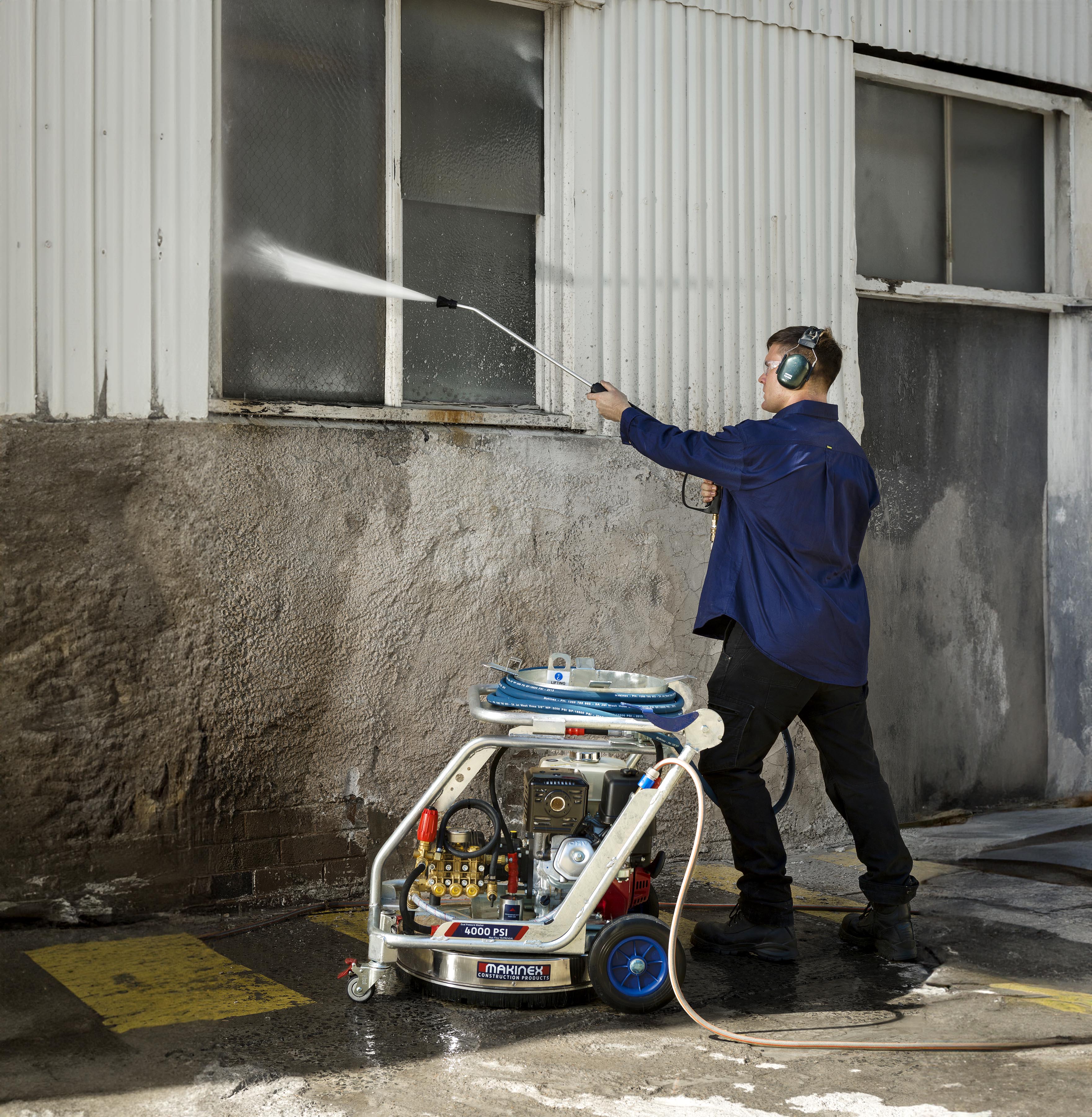 DPW 4000 Brand image showing pressure wand in action 2